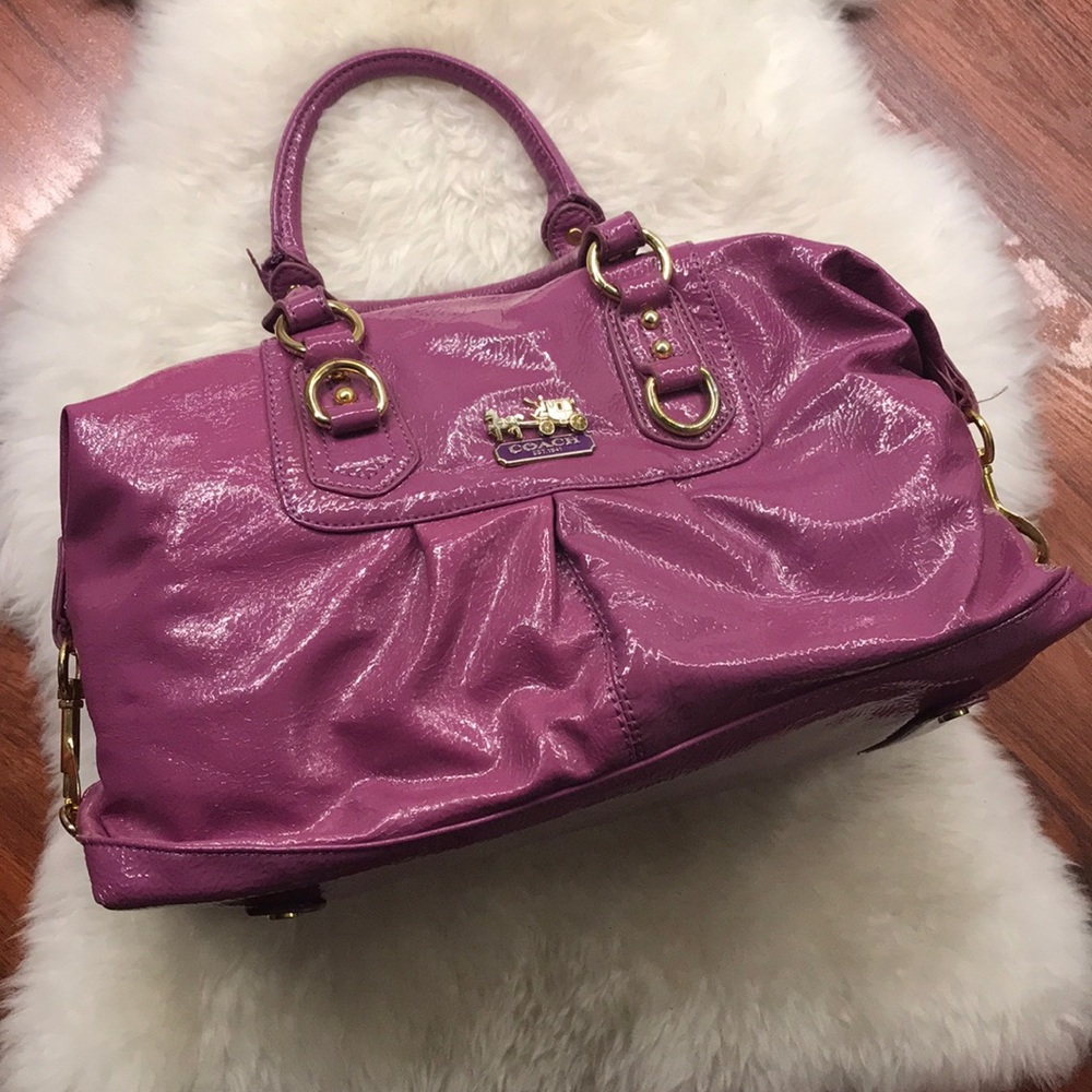 Coach Shiny lavender with gold accents Handbag.
